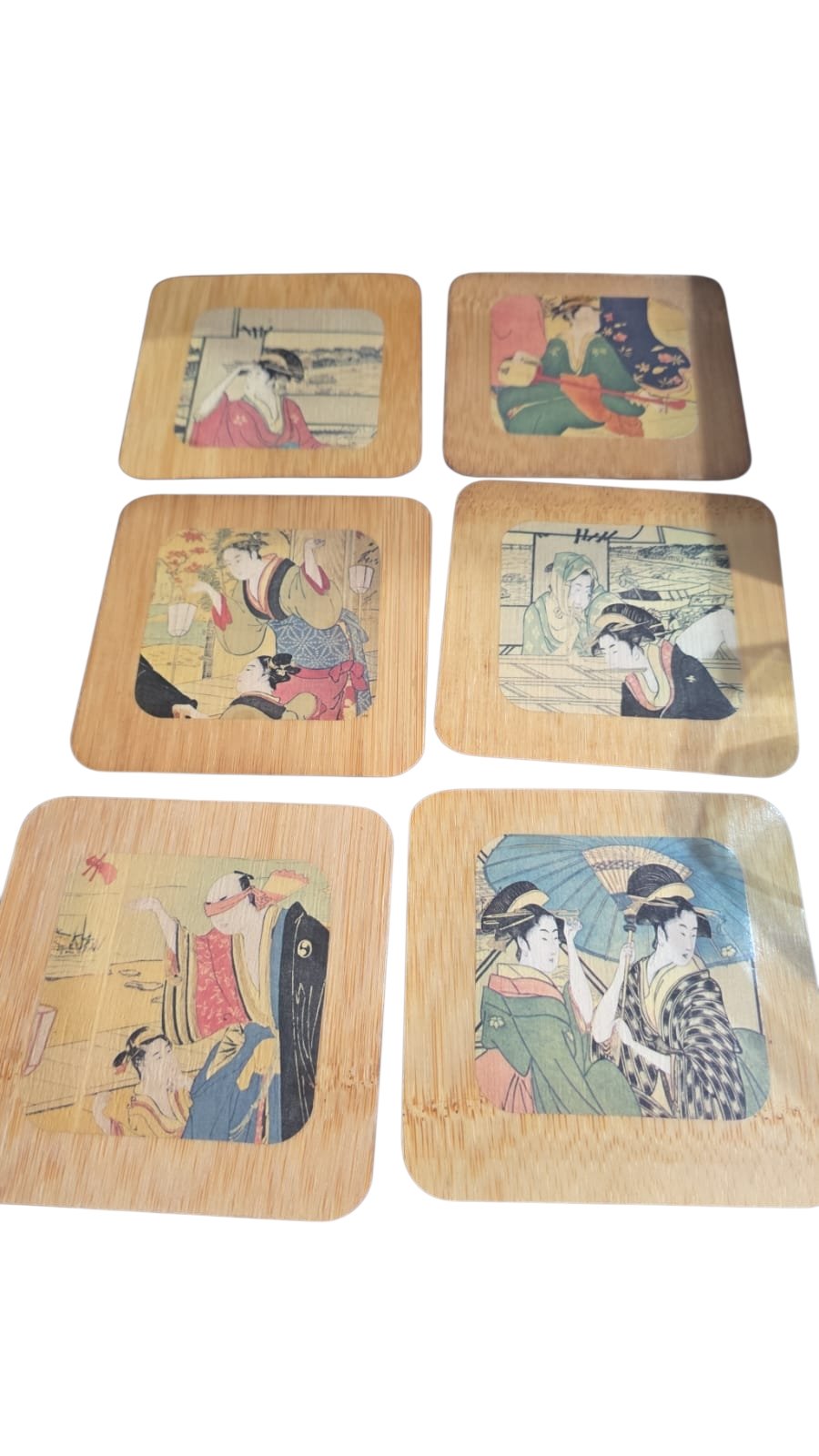 Conjunto de porta copos de lâminas de bambu com arte oriental