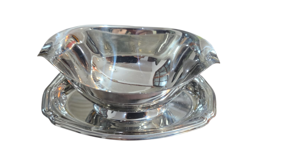 Antiga e elegante molheira Tramontina inox