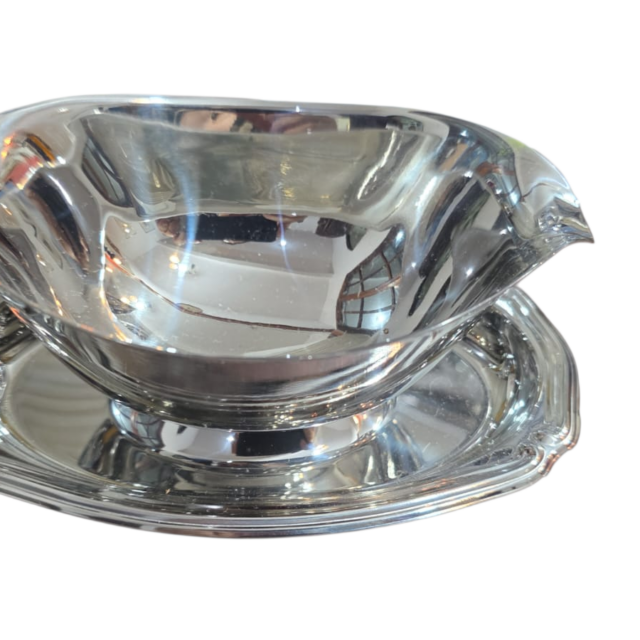 Antiga e elegante molheira Tramontina inox