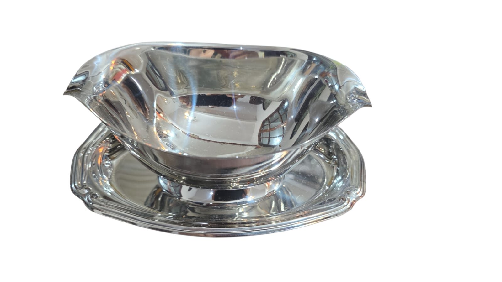 Antiga e elegante molheira Tramontina inox