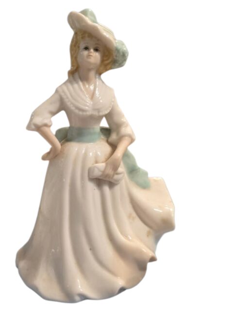 Escultura de dama antiga de porcelana