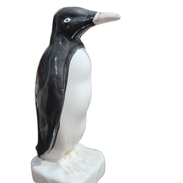 Antigo pinguim de geladeira de porcelana