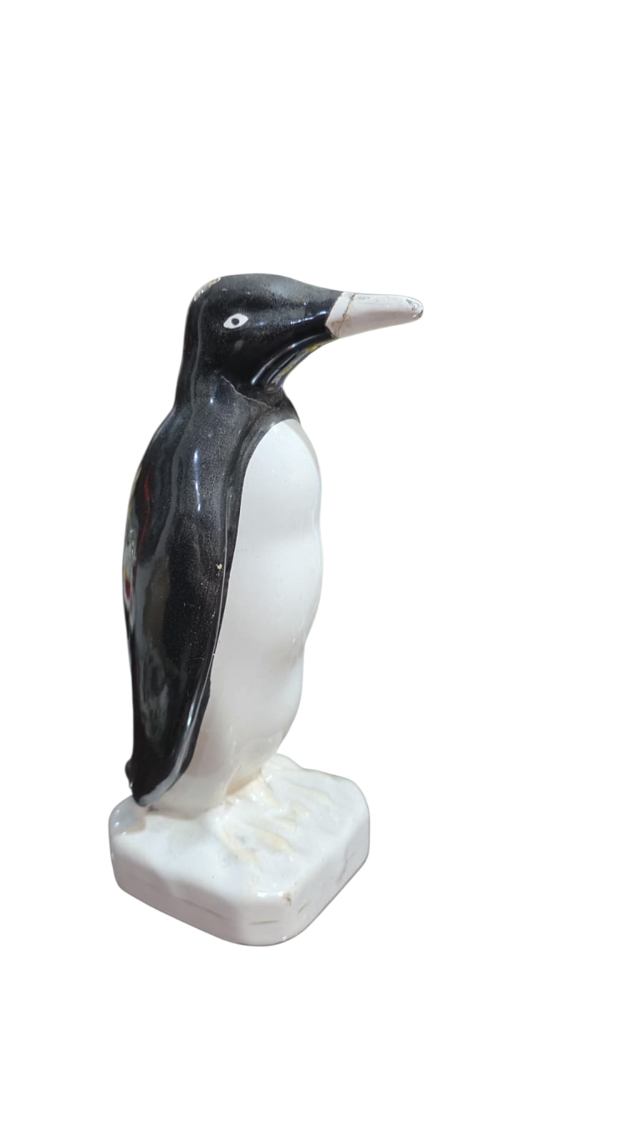 Antigo pinguim de geladeira de porcelana