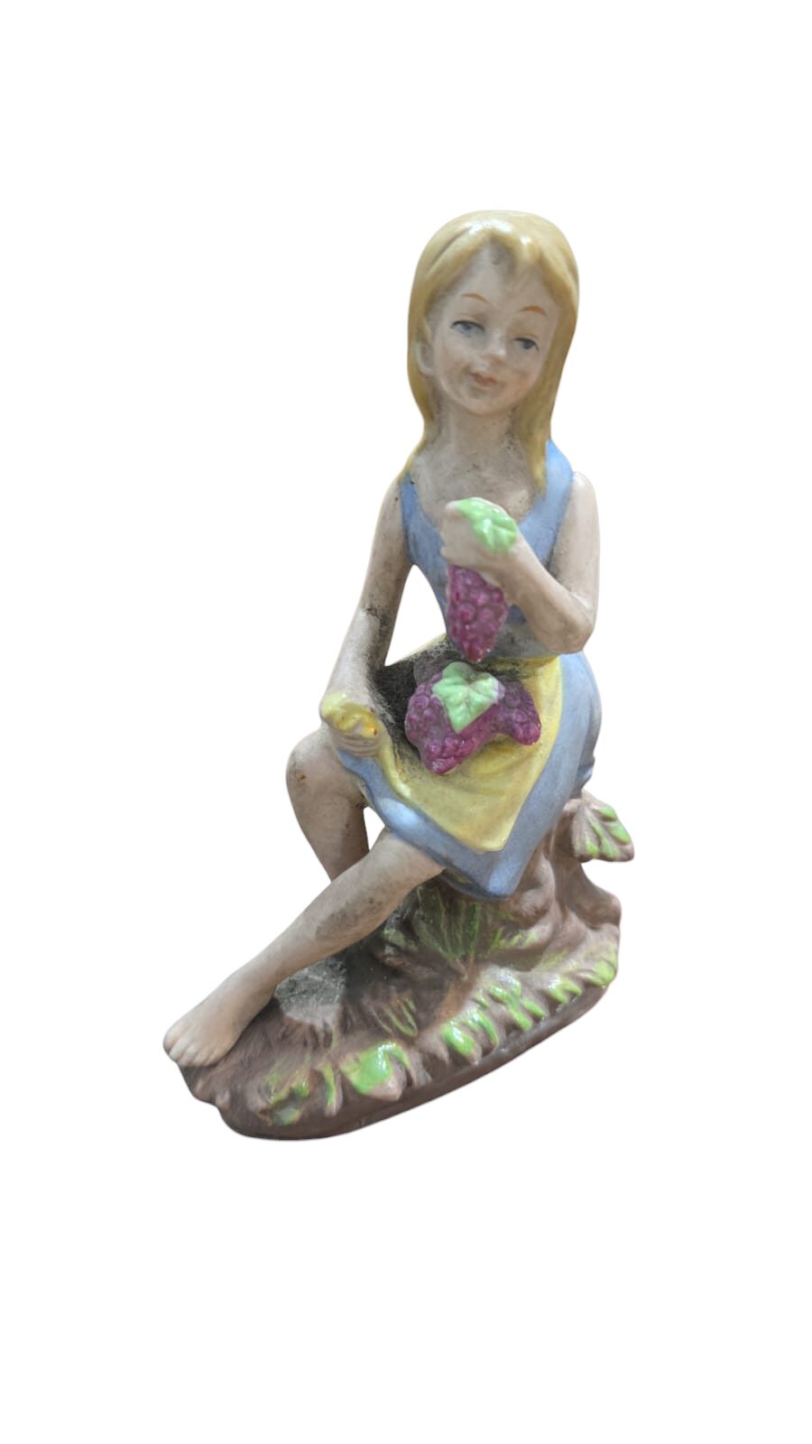 Antiga escultura de porcelana