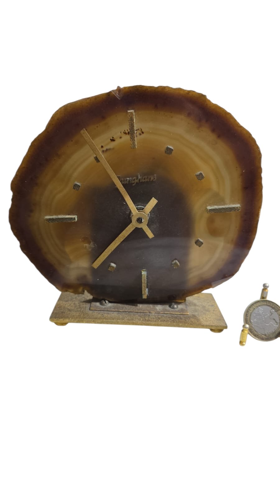 Relógio de pedra com base de bronze