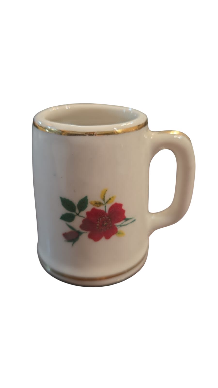 Pequena caneca de louça, motivos florais e filetes de ouro