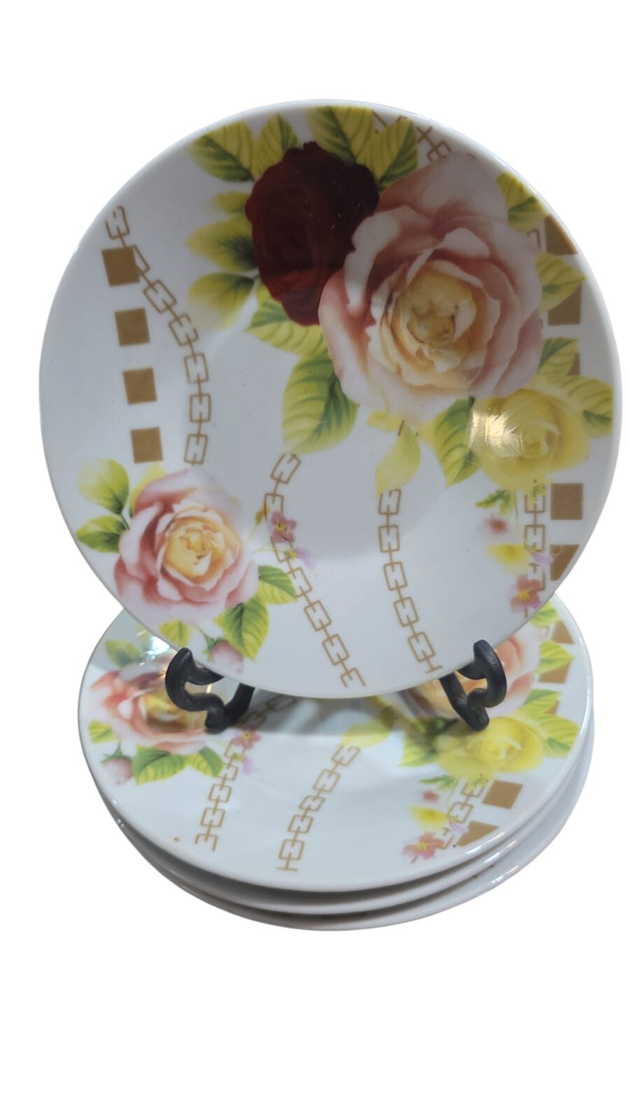Pires de chá de porcelana com motivos florais. (valor unitário)