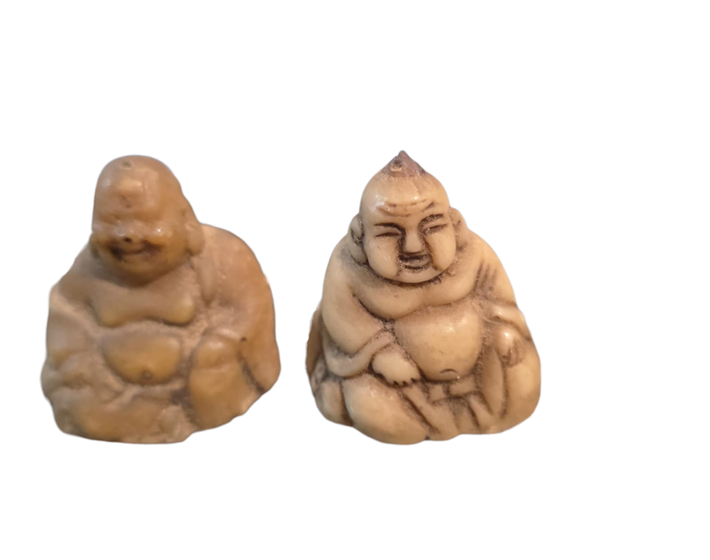 Par de pequenos Budas de resina