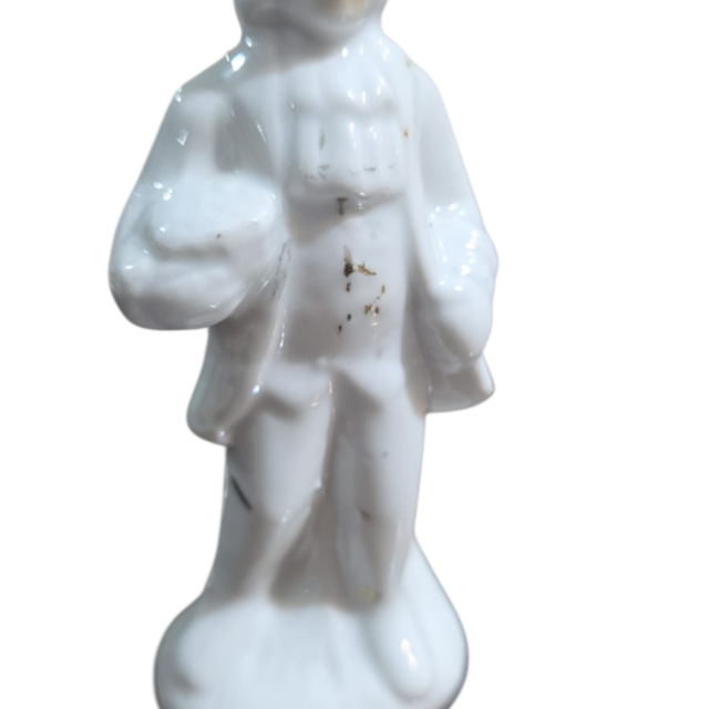 Antiga escultura de porcelana
