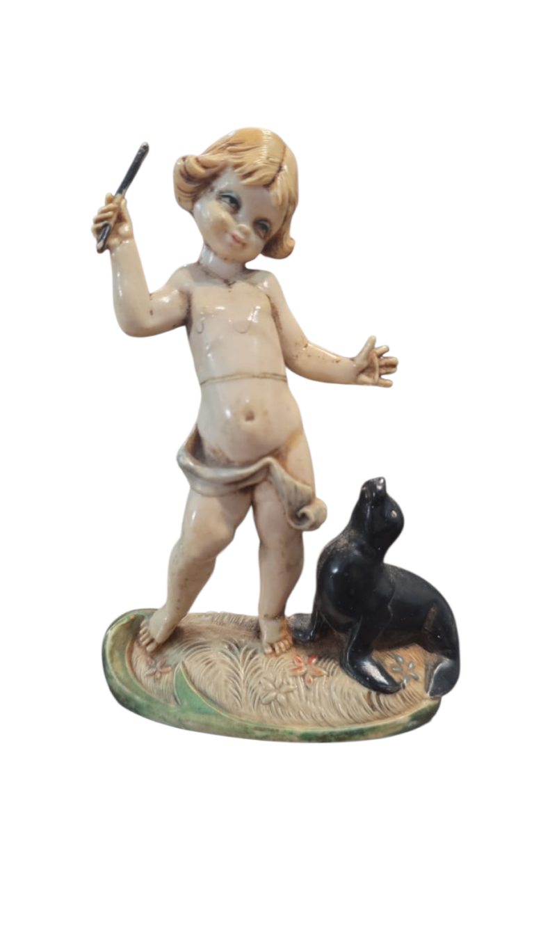 Escultura italiana de putino domador de foca