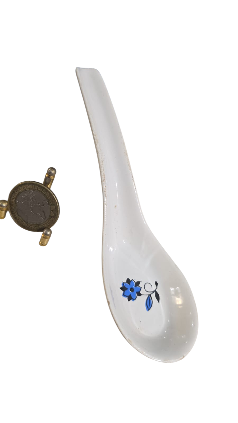 Antiga colher de porcelana