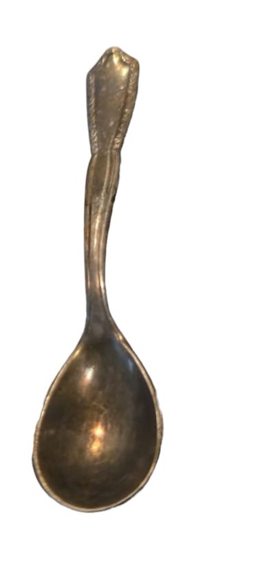 Pequena colher espessurada a prata