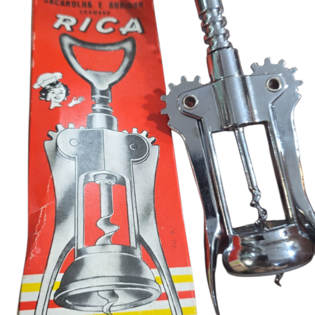 Antigo saca-rolhas com caixa original, sem uso, manufatura Rica