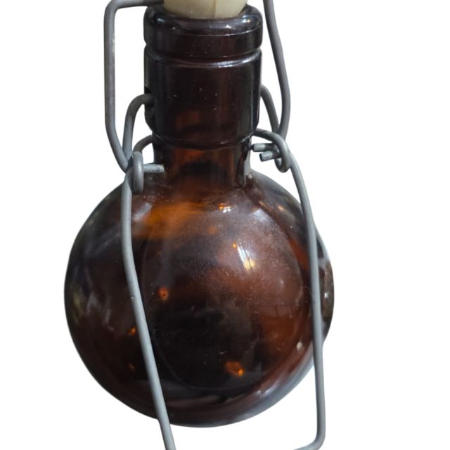 Antiga e rara garrafa âmbar
