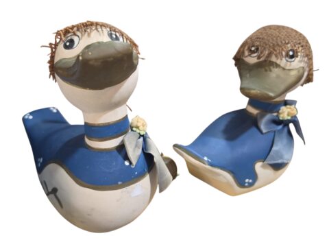 Patos de cerâmica pintados a mão