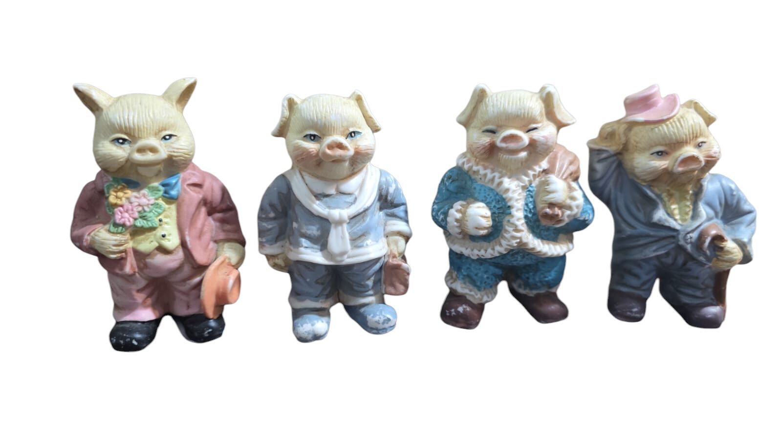 Quarteto de porquinhos antigos de porcelana
