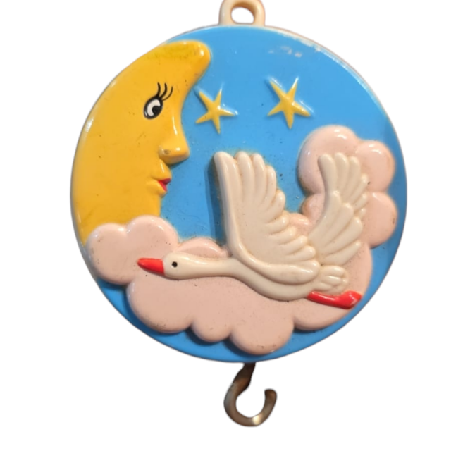 Antiga decoração musical a corda para berço