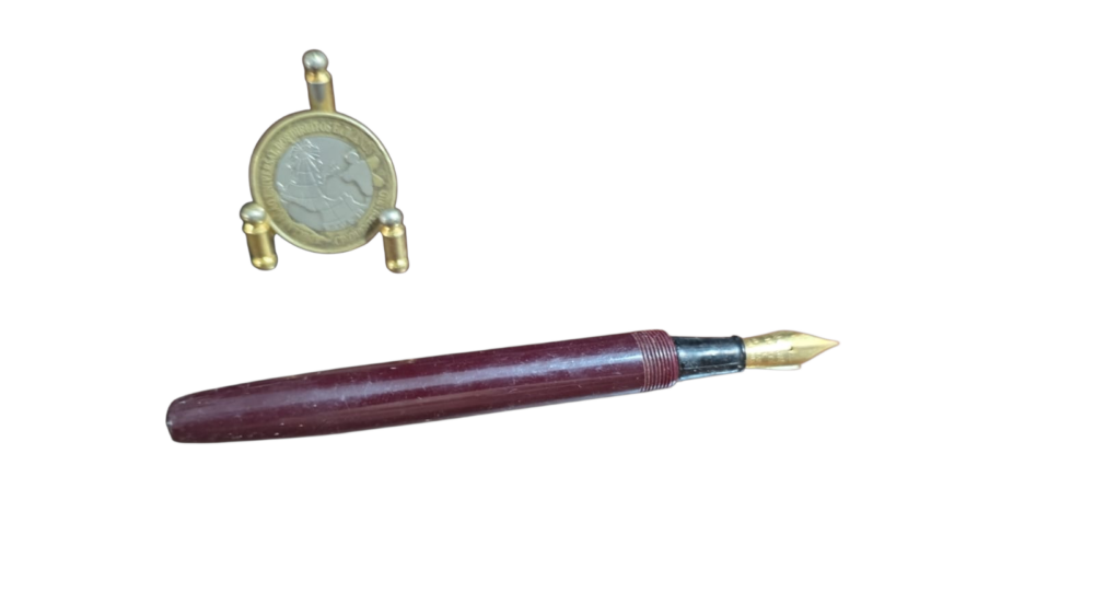 Antiga elegante caneta bico de pena