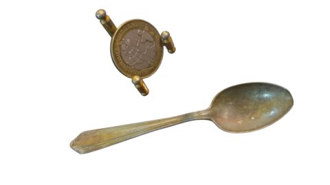 Antiga colher espessurada a prata