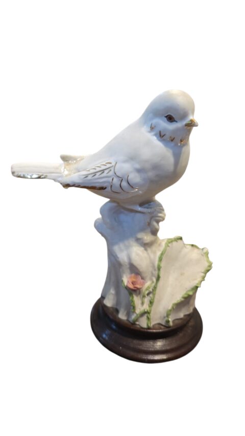 Antiga escultura pássaro de porcelana