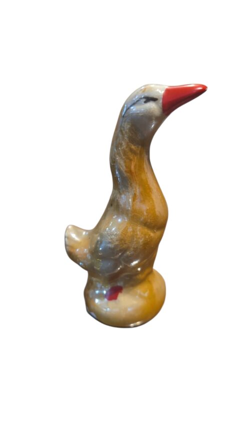 Escultura de pato de louça