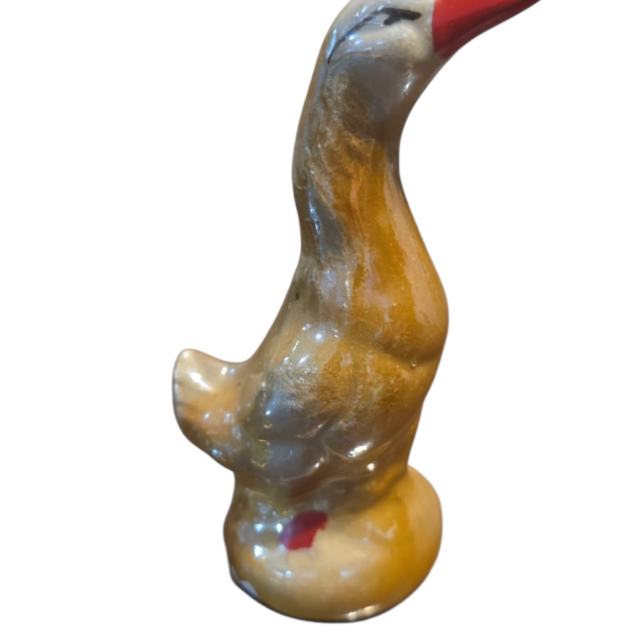 Escultura de pato de louça