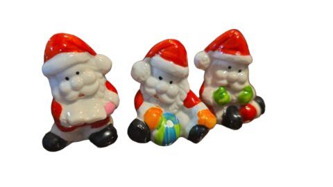 Trio de noéis de porcelana