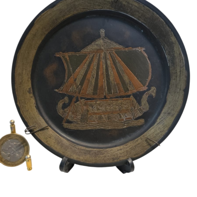 Medalhão de metal para parede