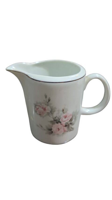 Delicada leiteira de porcelana Schmidt, motivos florai
