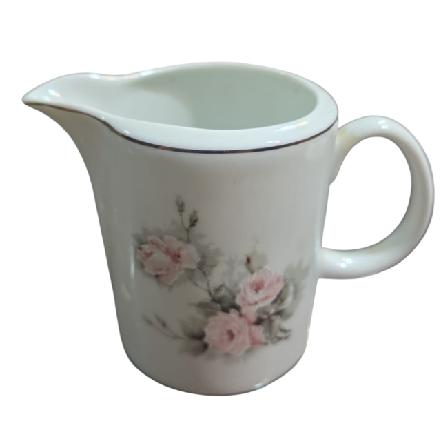 Delicada leiteira de porcelana Schmidt, motivos florai