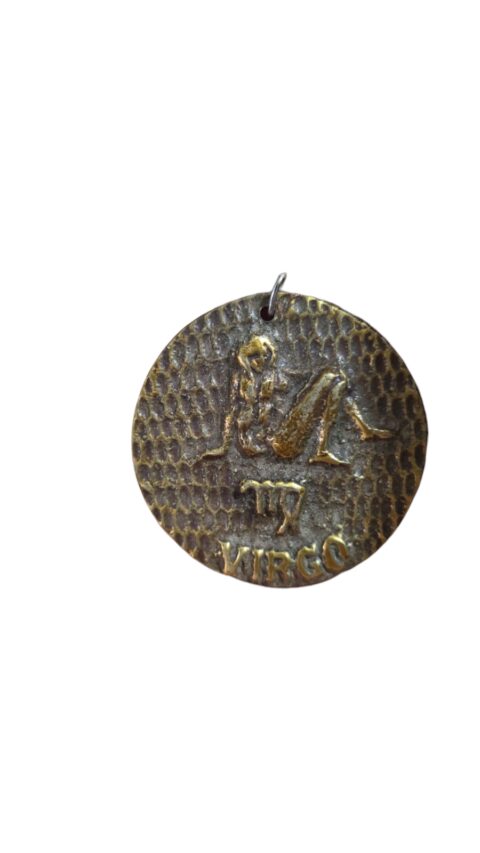 Antiga peça de bronze do signo de virgem