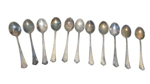 Antigas e elegantes colheres espessuradas a prata