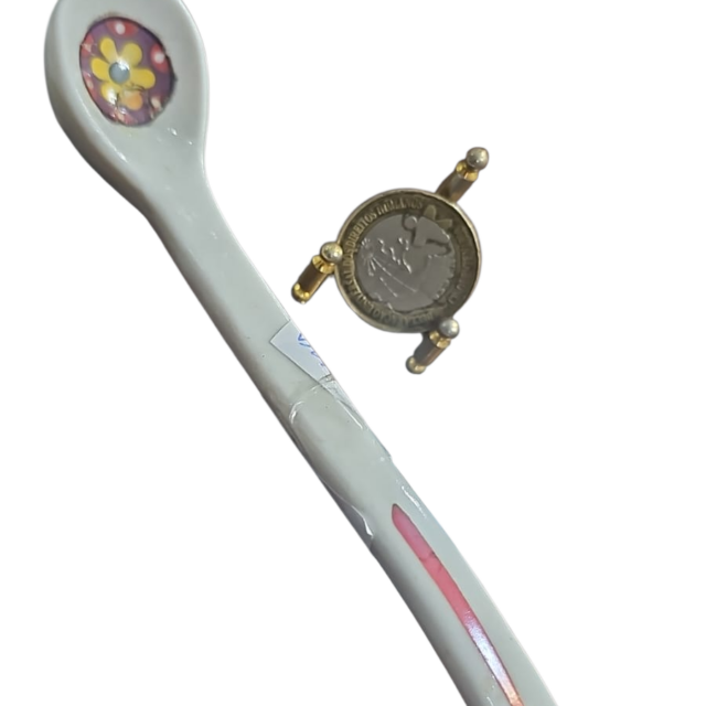Antiga colher de porcelana