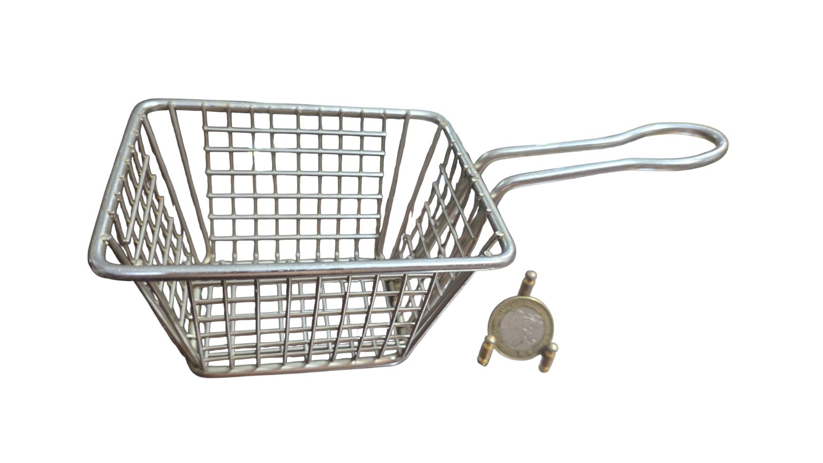 Antiga cesta de fritura de metal.