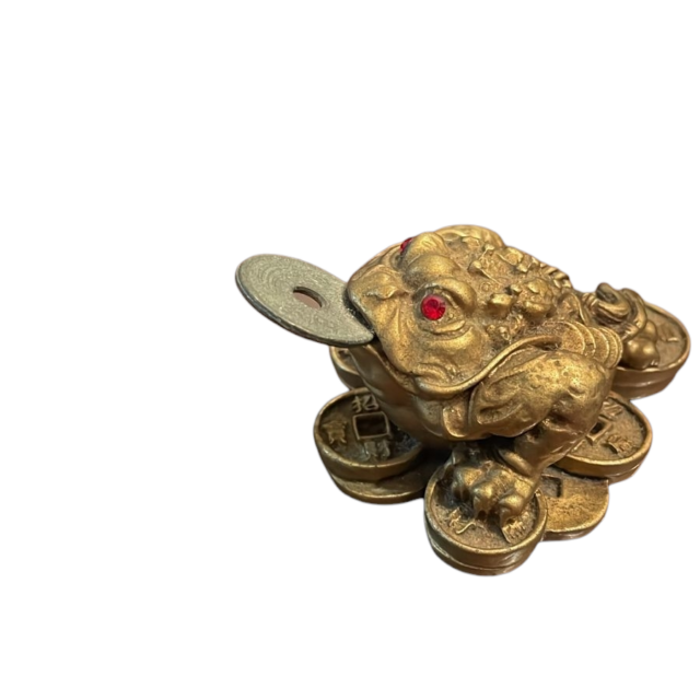 Sapo da fortuna oriental, com moeda na boca