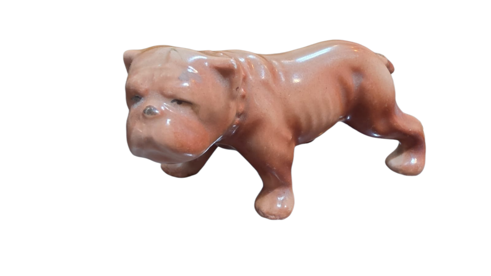 Cachorro em porcelana