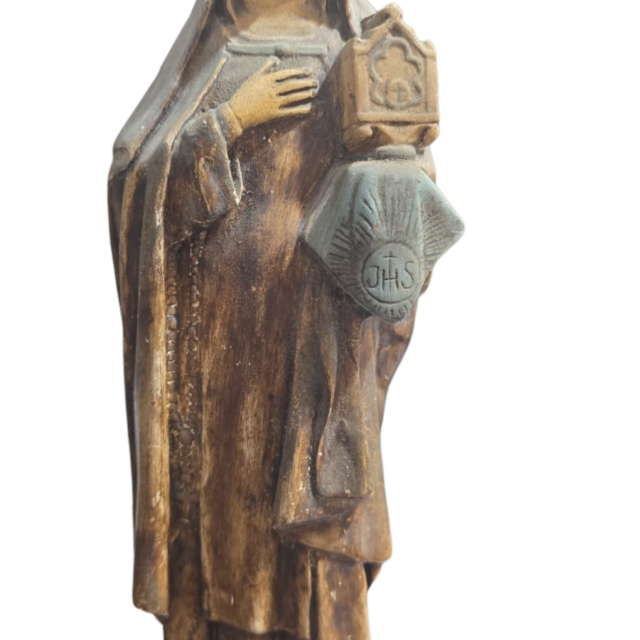 Antiga e bela imagem sacra em estuque