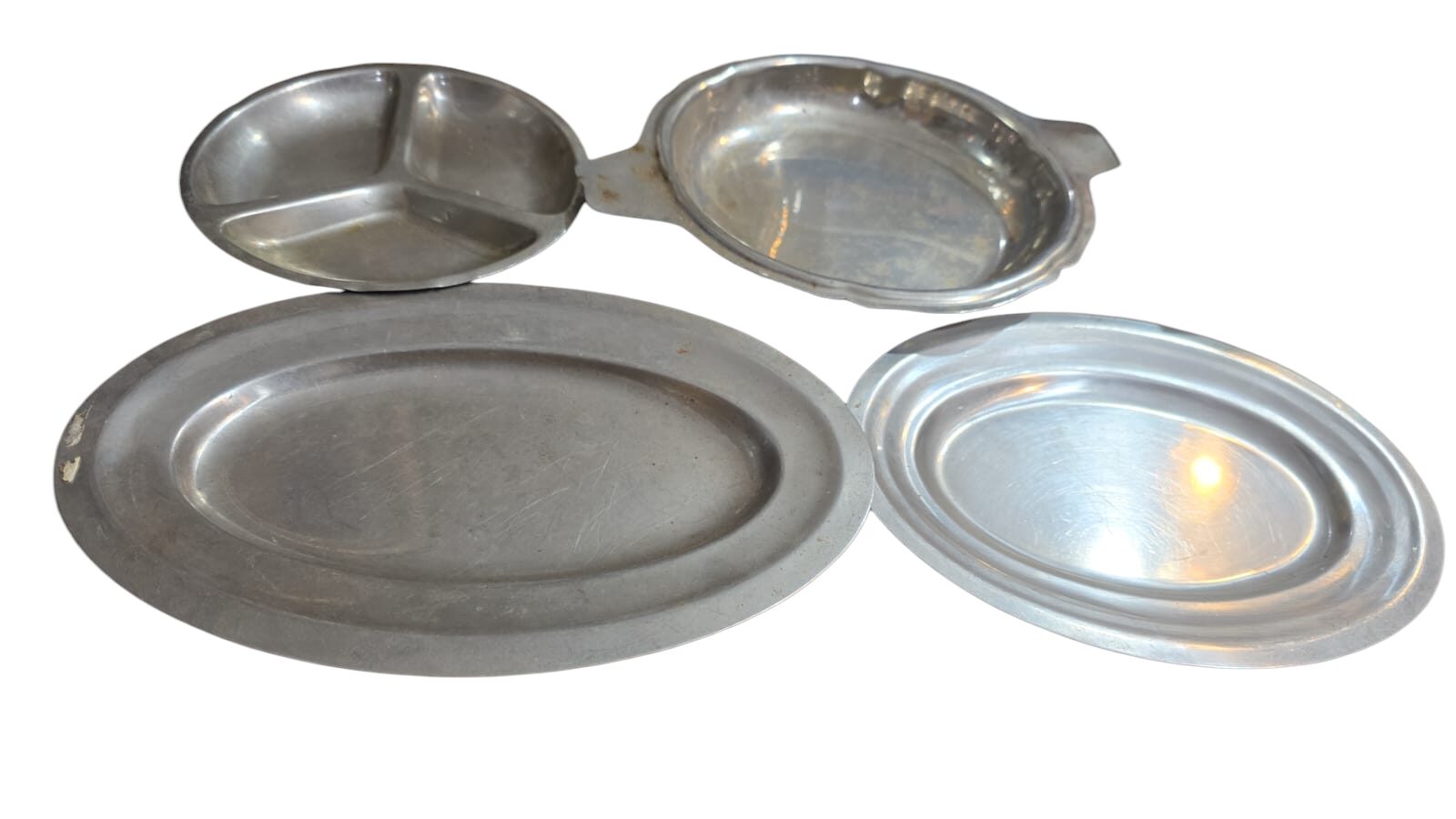 Lote de quatro peças antigas inox