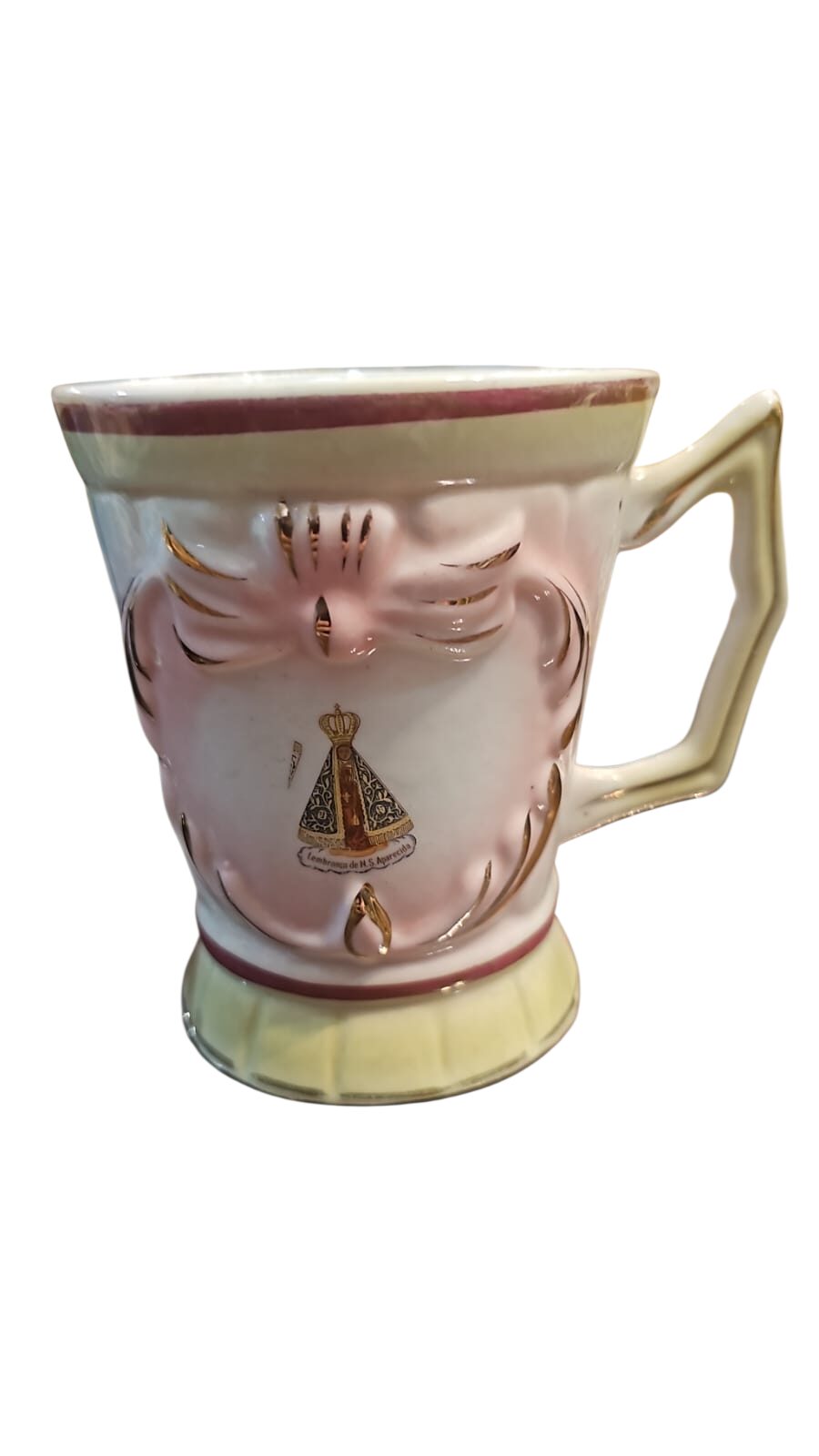 Caneca antiga de porcelana com arte sacra e dourações