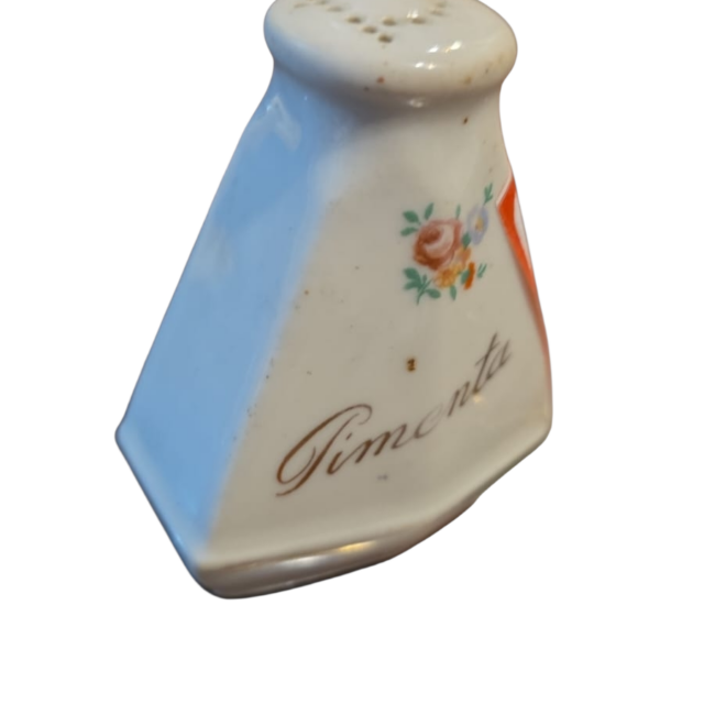 Antigo pimenteiro de porcelana