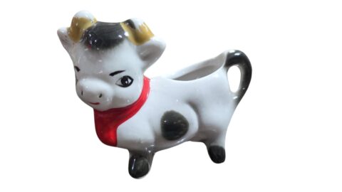 Vaquinha floreira de porcelana