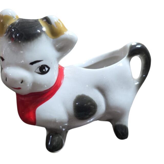 Vaquinha floreira de porcelana