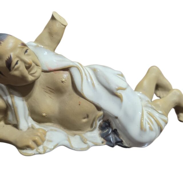 Escultura oriental de porcelana