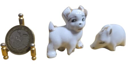 Par de animais antigos de porcelana