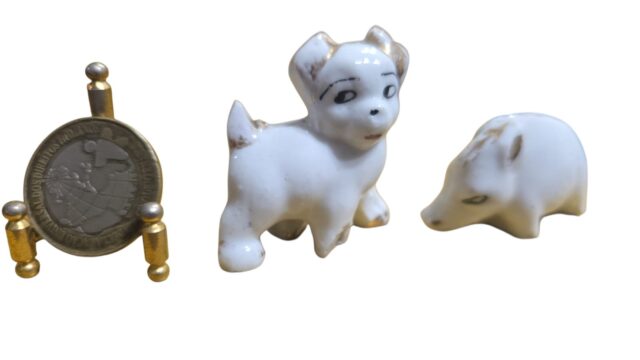 Par de animais antigos de porcelana