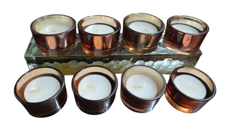 Elegantes castiçais de vidro com vela. (valor unitário)