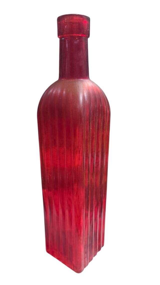 Antiga garrafa de vidro canelado
