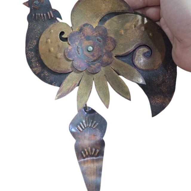 Antiga decoração de pendurar de cobre