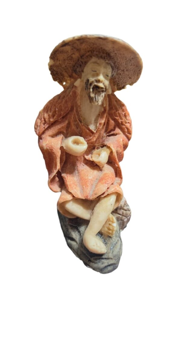 Escultura oriental em resina