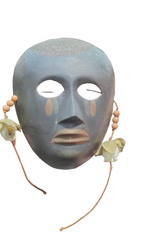 Antiga máscara de bronze